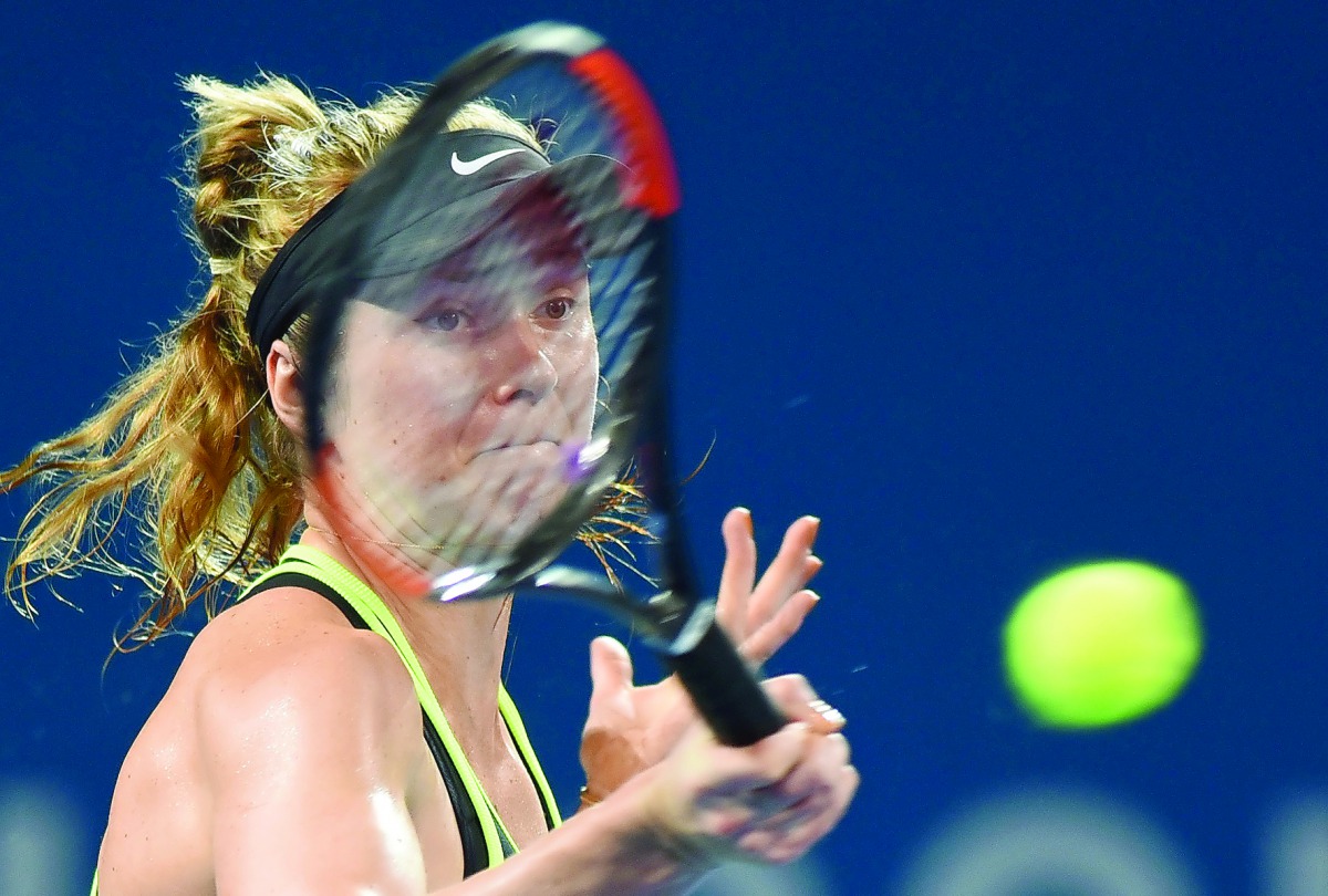 Ukraine's Elina Svitolina hits a return to Germany's Angelique Kerber during their Brisbane International match played at Pat Rafter Arena in Brisbane, Australia yesterday. Svitolina won 6-4, 3-6, 6-3.
