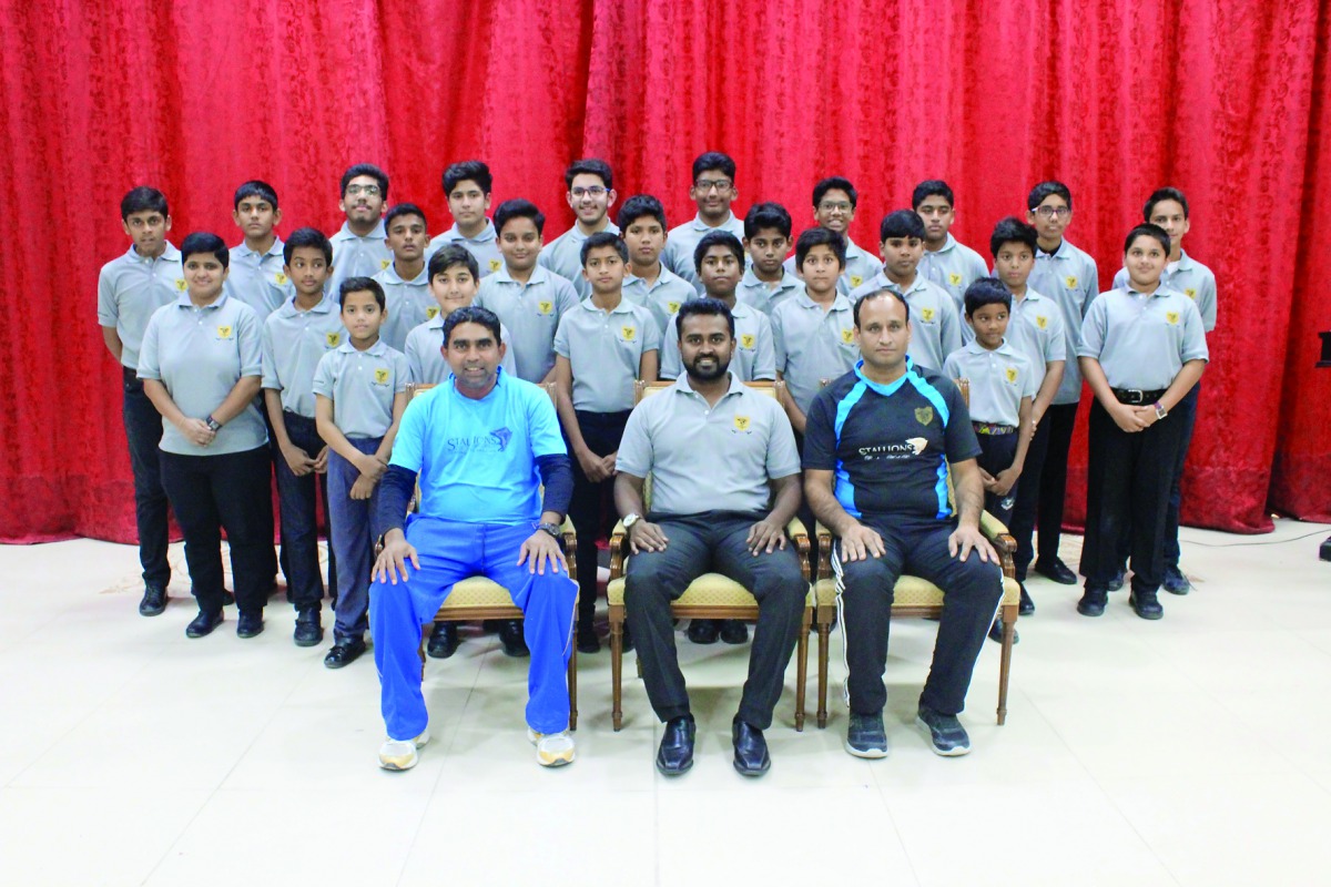 Stallions Cricket Academy team members pose for a photo.