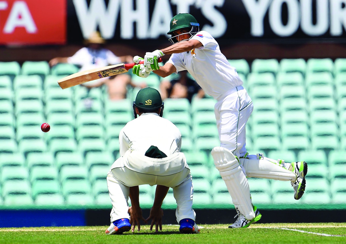 Pakistani batsman Younis Khan hits the ball past Australian fielder Peter Handscomb on the fourth day of the third Test at the SCG, in Sydney yesterday.