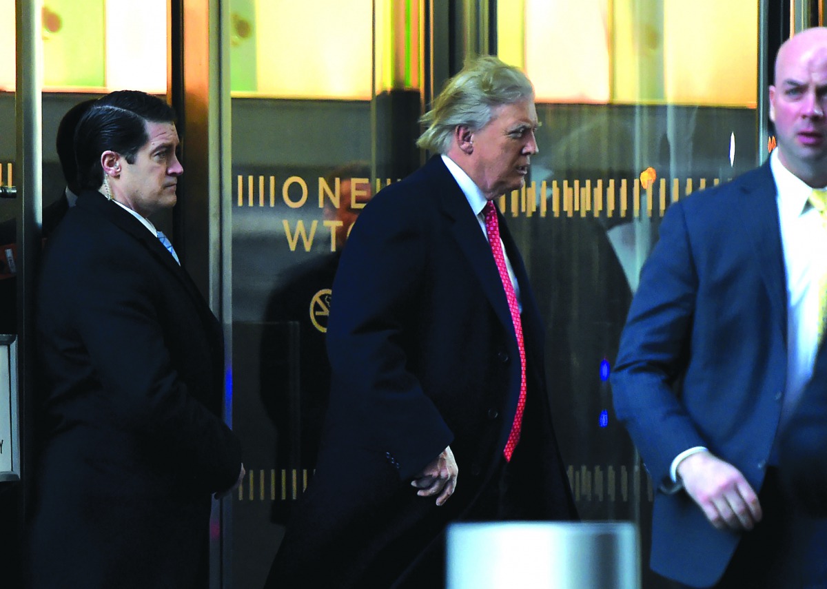 President-elect Donald Trump leaving One World Trade Center after a meeting with editors at Conde Nast in New York, yesterday.