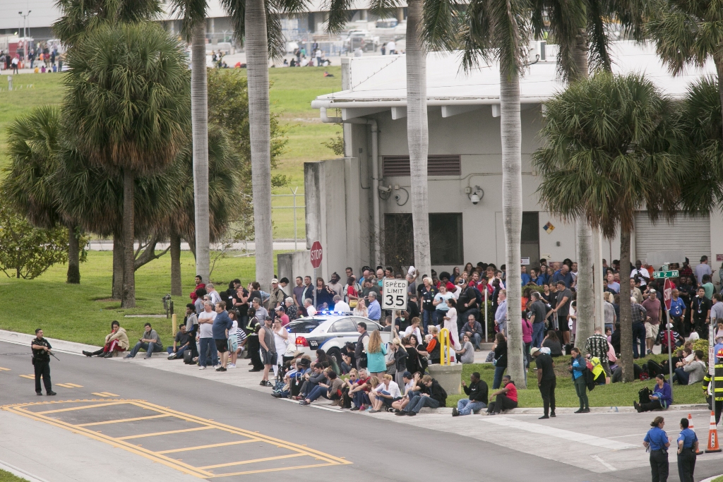 Passengers who were at Fort Lauderdale International Airport during Friday’s shooting were rounded up and not allowed to leave until police could confirm they had nothing to do with the shooting on January 06, 2017 in Florida, USA. ( Carlos Miller - Anado