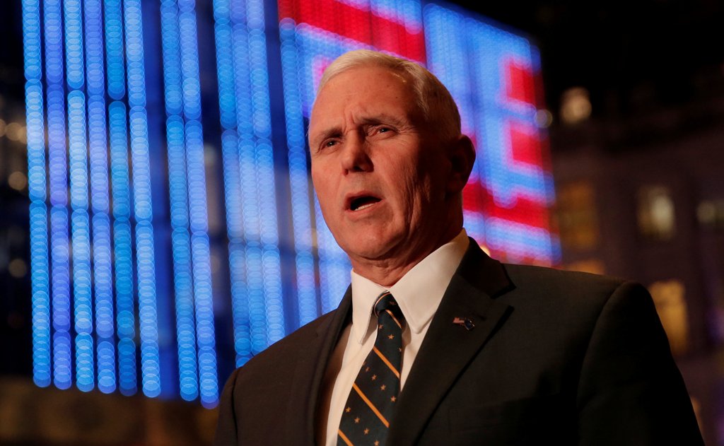 U.S. Vice President-elect Mike Pence speaks to reporters as he exits Trump Tower in New York, U.S., January 6, 2017. REUTERS/Mike Segar
