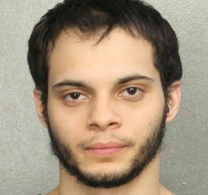 Esteban Santiago, 26, was accused of killing five, wounding six and sending thousands scrambling for safety in a shooting rampage at the Fort Lauderdale International Airport (AFP Photo/).