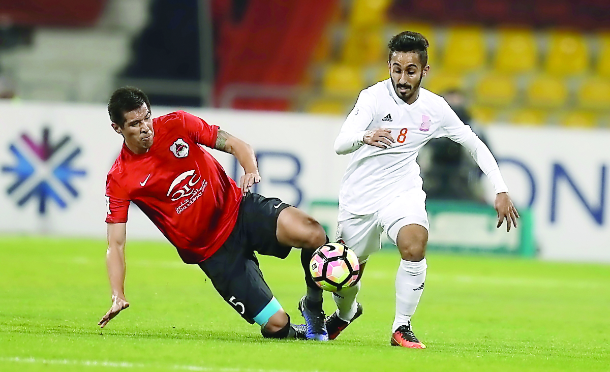 Action from the Qatar Stars League match between Al Rayyan and Umm Salal yesterday. Al Rayyan won 1-0 with Sergio Garcia scoring in the 51st minute. 
