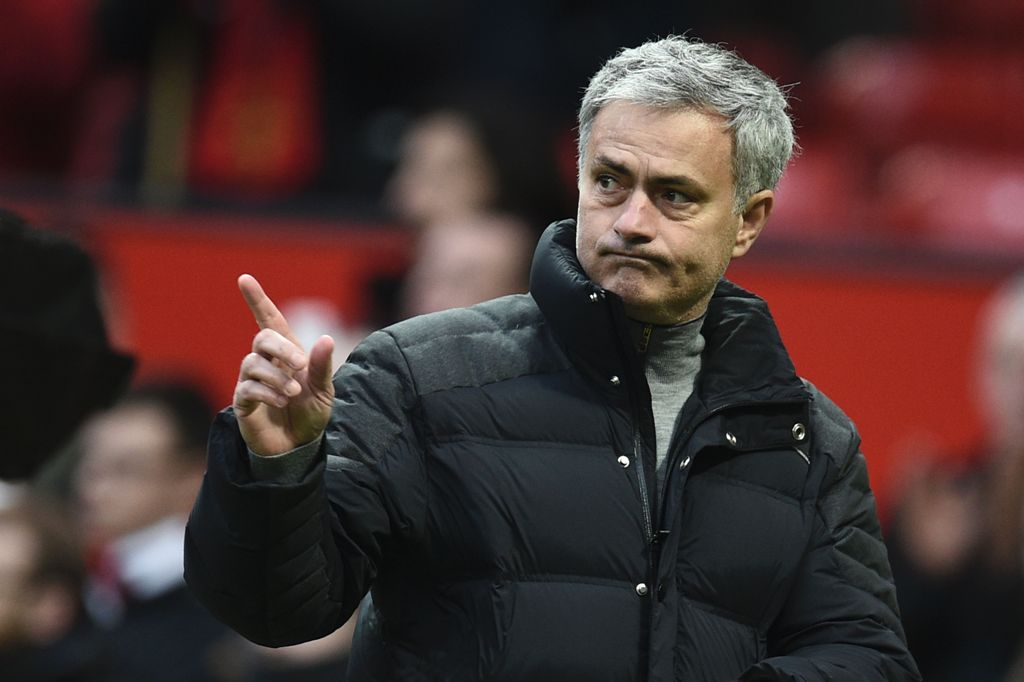 Manchester United's Portuguese manager Jose Mourinho leaves the pitch at the end of the English FA Cup third round football match between Manchester United and Reading at Old Trafford in Manchester, north west England, on January 7, 2017.  AFP / Oli SCARF