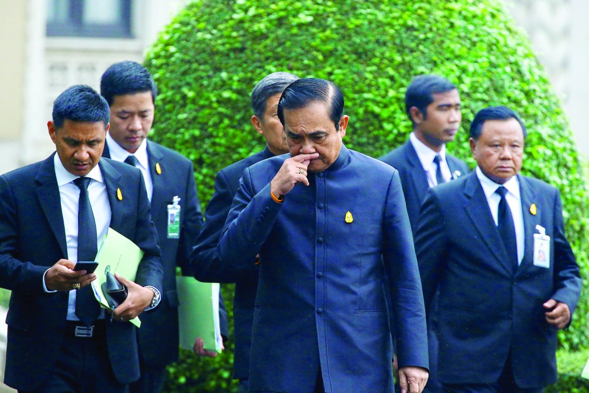 Thailand Prime Minister Prayuth Chan-ocha arrives at a weekly cabinet meeting at Government House in Bangkok, yesterday.