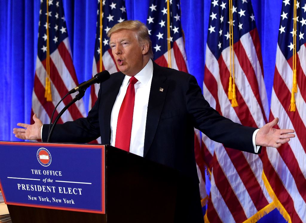 US President-elect Donald Trump speaks during a press conference January 11, 2017 at Trump Tower in New York. AFP / TIMOTHY A. CLARY
