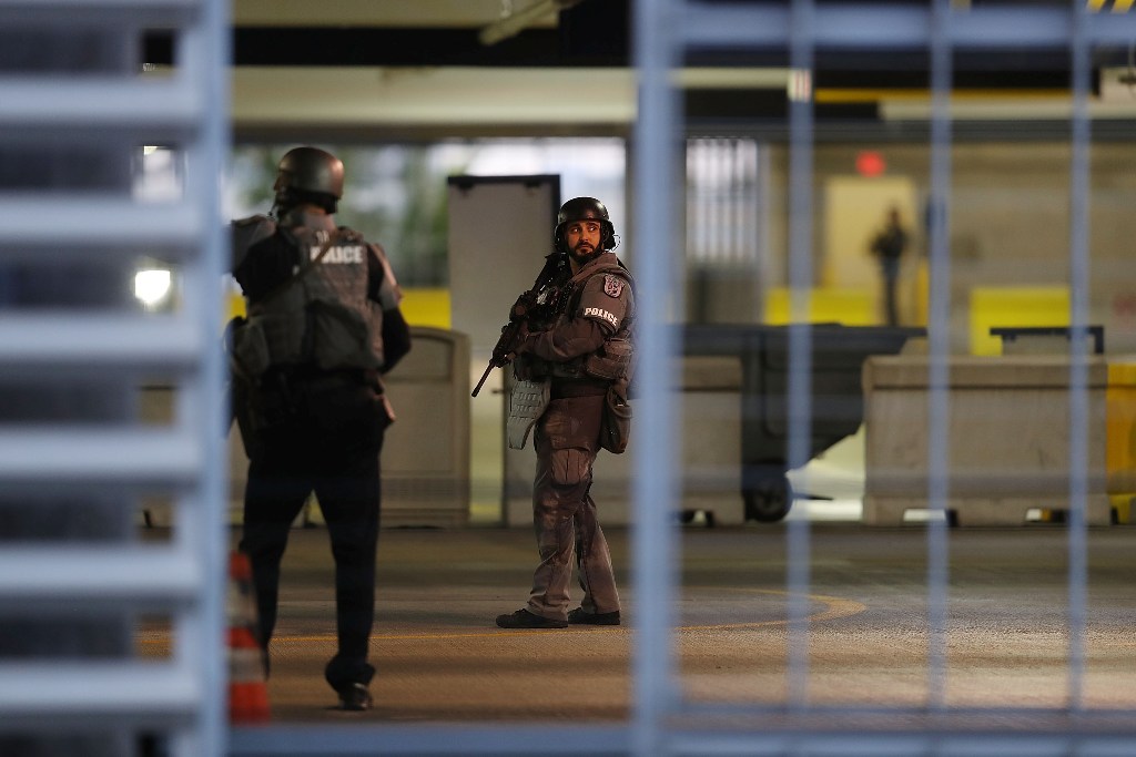 (FILES) This file photo taken on January 6, 2017 shows first responders securing the area outside the Fort Lauderdale-Hollywood International airport after a shooting took place near the baggage claim in Fort Lauderdale, Florida.  AFP / JOE RAEDLE