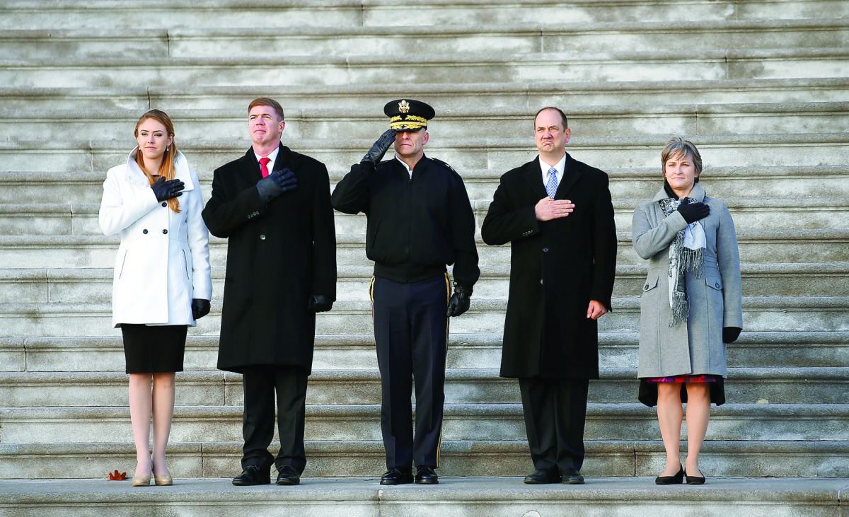 Stand-ins for President-elect Donald Trump, and his wife Melania (left) and Vice-President-elect Mike Pence and his wife Karen (right) take part in a rehearsal for the inauguration on the East Front of the US Capitol in Washington, yesterday.