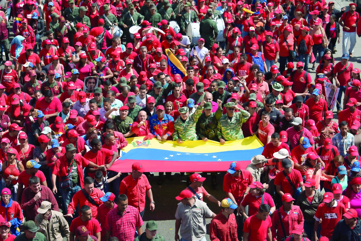 Supporters of Venezuelan President Nicolas Maduro demonstrate in Caracas yesterday.