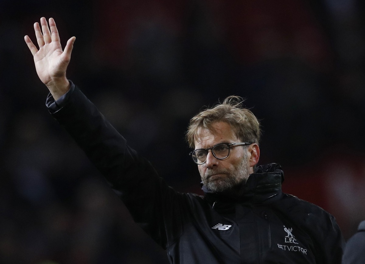 Liverpool manager Juergen Klopp waves to fans after the game. (Reuters / Phil Noble)