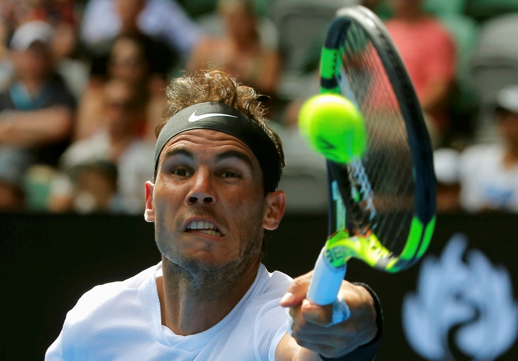 Tennis - Australian Open - Melbourne Park, Melbourne, Australia - 17/1/17 Spain's Rafael Nadal stretches to hit a shot during his Men's singles first round match against Germany's Florian Mayer. REUTERS/Jason Reed