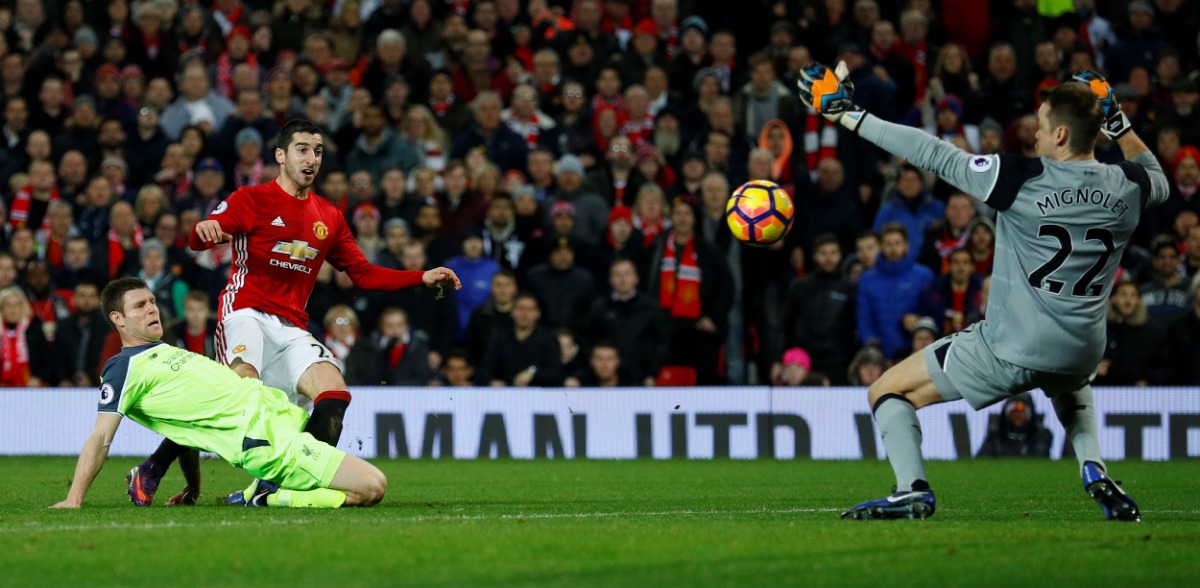 Britain Soccer Football - Manchester United v Liverpool - Premier League - Old Trafford - 15/1/17 Liverpool's Simon Mignolet saves from Manchester United's Henrikh Mkhitaryan Reuters / Phil Noble Livepic
