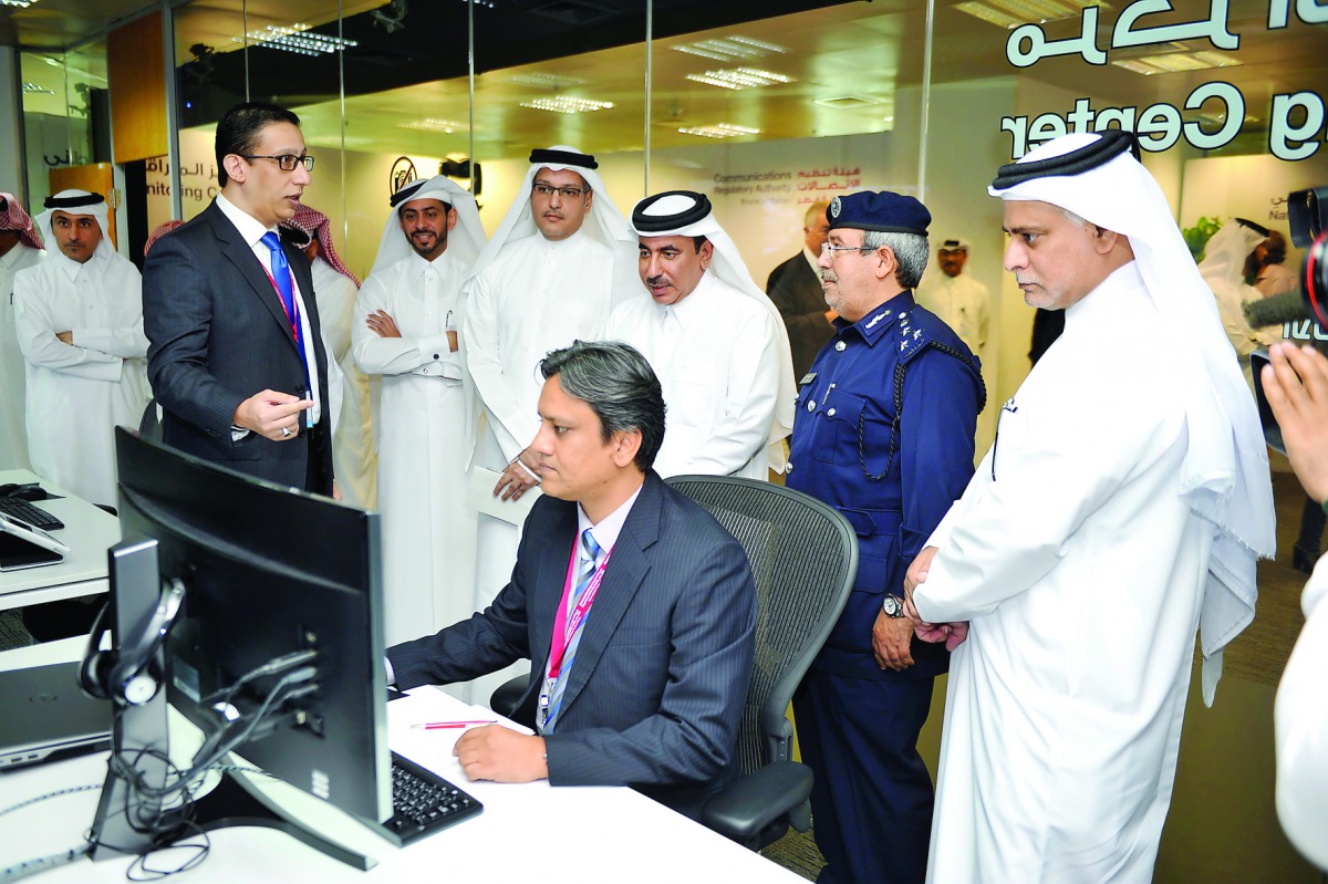 Minister of Transport and Communications H E Jassim bin Saif Al Sulaiti (third right), with Yousuf Al Kubaisi (right), CEO of Ooredoo Global services; Mohammed Ali Al Mannai, President of CRA (fourth left); and other officials at the launch of National Mo