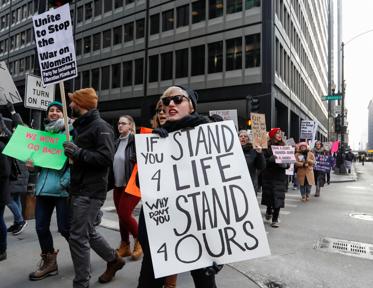 Anti-Trump demonstrators protest at abortion rights rally in Chicago, Illinois, January 15, 2017. REUTERS/Kamil Krzaczynski