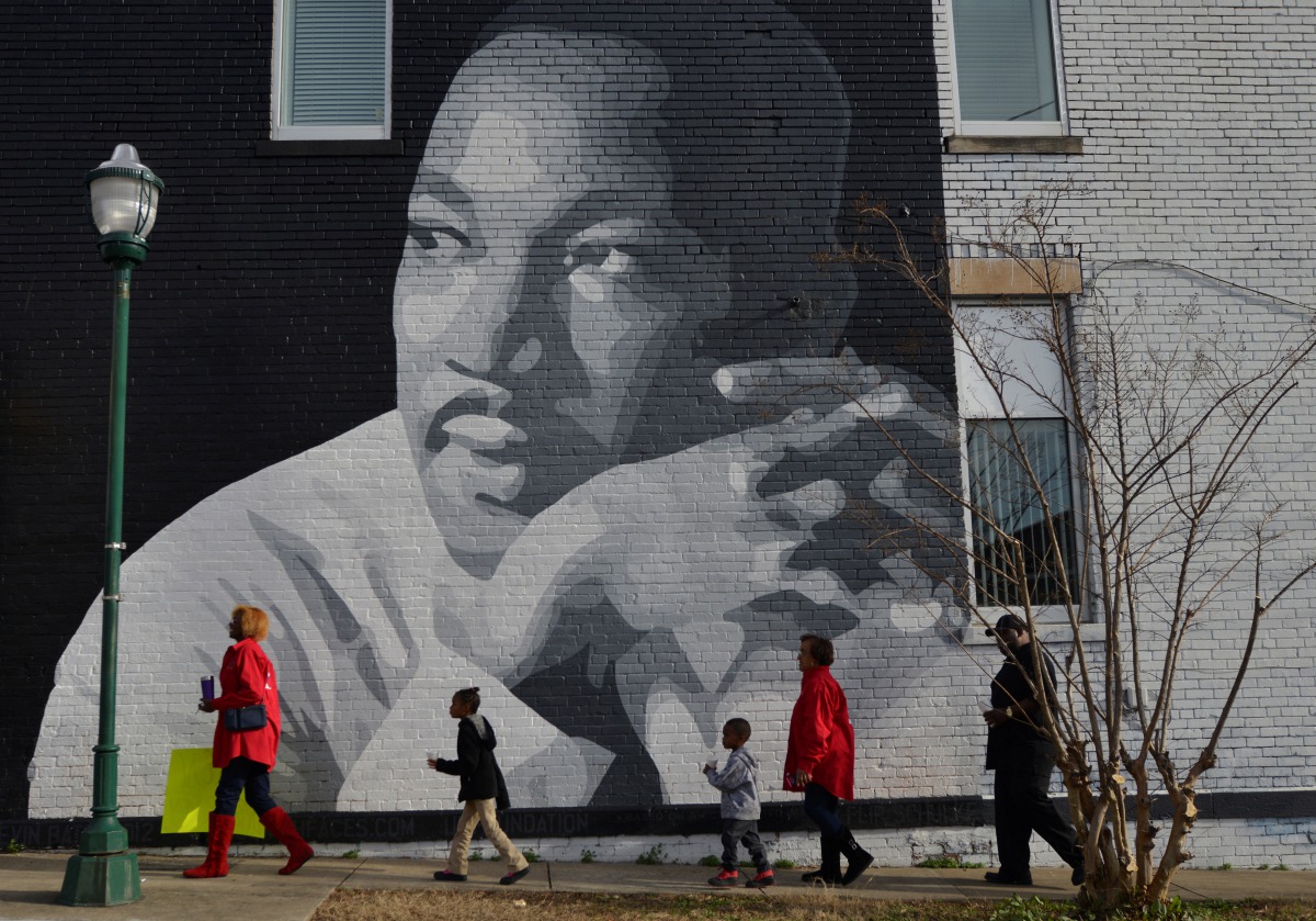 People gather to march in the annual parade down MLK Boulevard to honor Martin Luther King, in Chattanooga, Tennessee, U.S., January 16, 2017. REUTERS/Billy Weeks