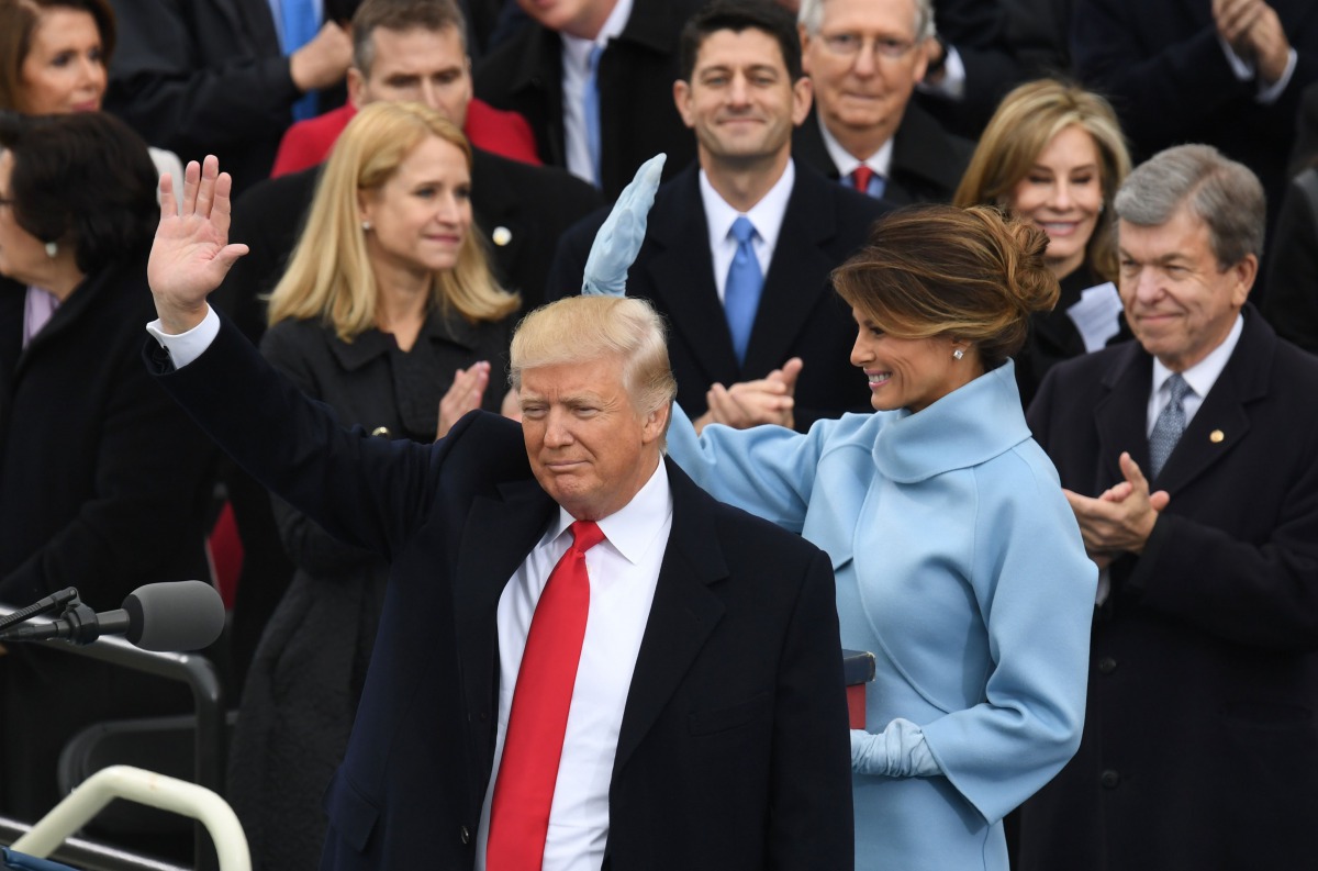 US President Donald Trump gestures after being sworn in as President on January 20, 2017 at the US Capitol in Washington, DC. / AFP / Mark RALSTON