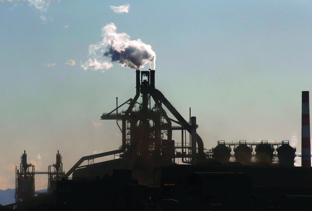 Chimneys of a steel factory at an industrial area in Kawasaki, Japan, yesterday. 
