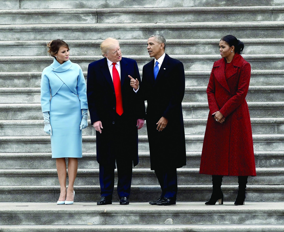 US President Donald Trump and First Lady Melania Trump, with former president Barack Obama and Michelle Obama before their departure from the US Capitol, yesterday.