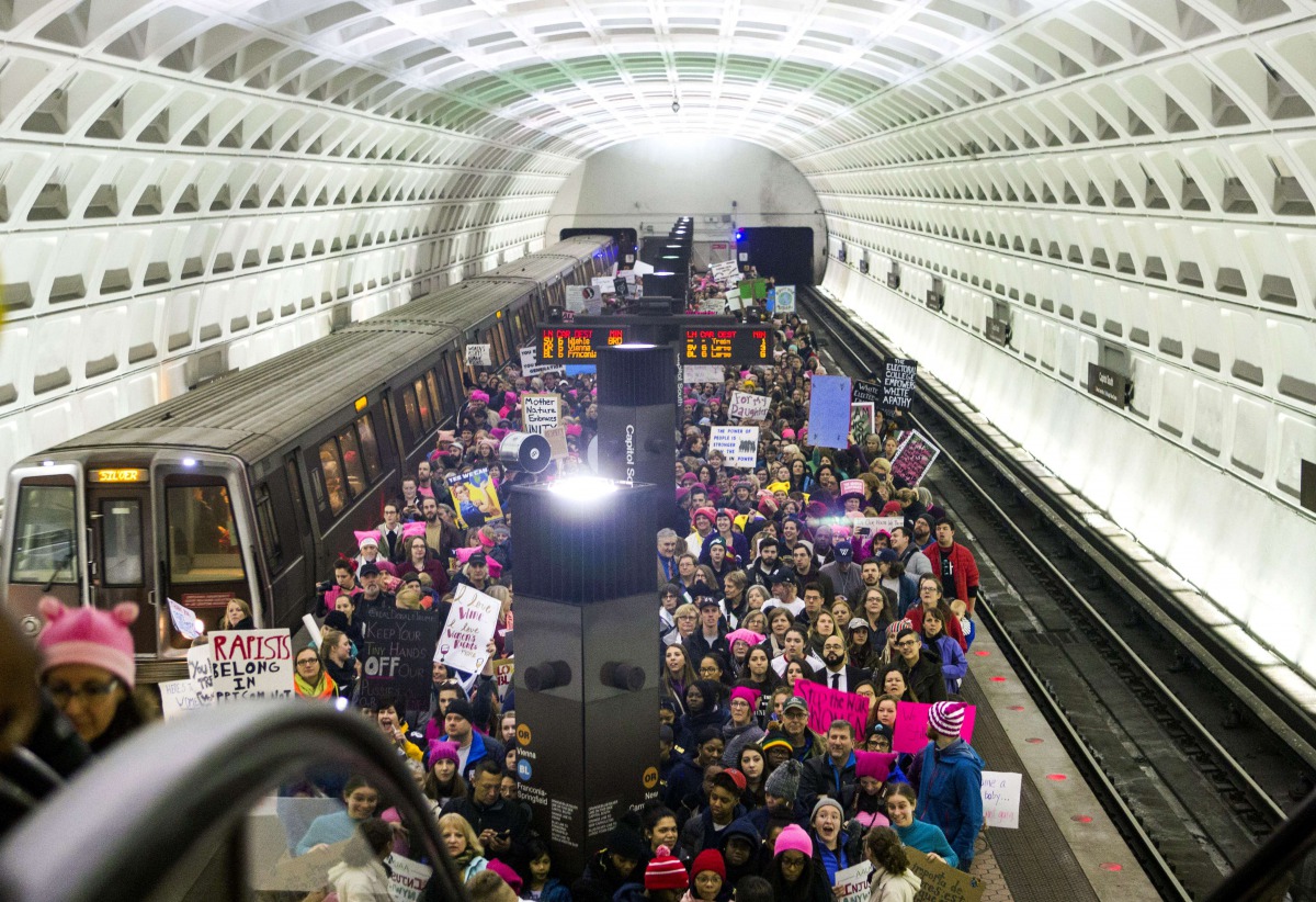 Protesters arrive on the platform at the Capital South Metro station for the Women's March on Washington on January 21, 2017 in Washington, DC. (Jessica Kourkounis/Getty Images/AFP)