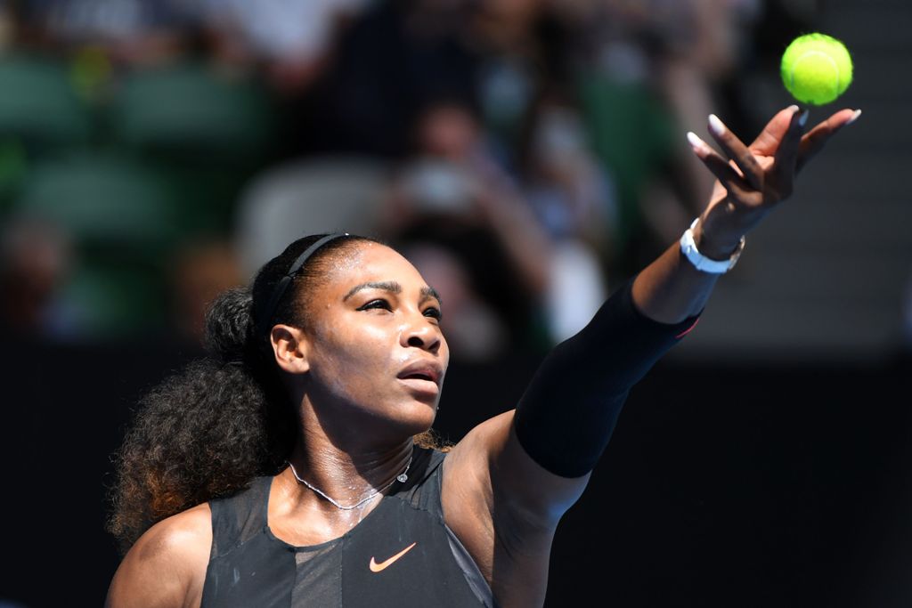 Serena Williams of the US serves against Czech Republic's Barbora Strycova during their women's singles fourth round match on day eight of the Australian Open tennis tournament in Melbourne on January 23, 2017.  AFP / WILLIAM WEST