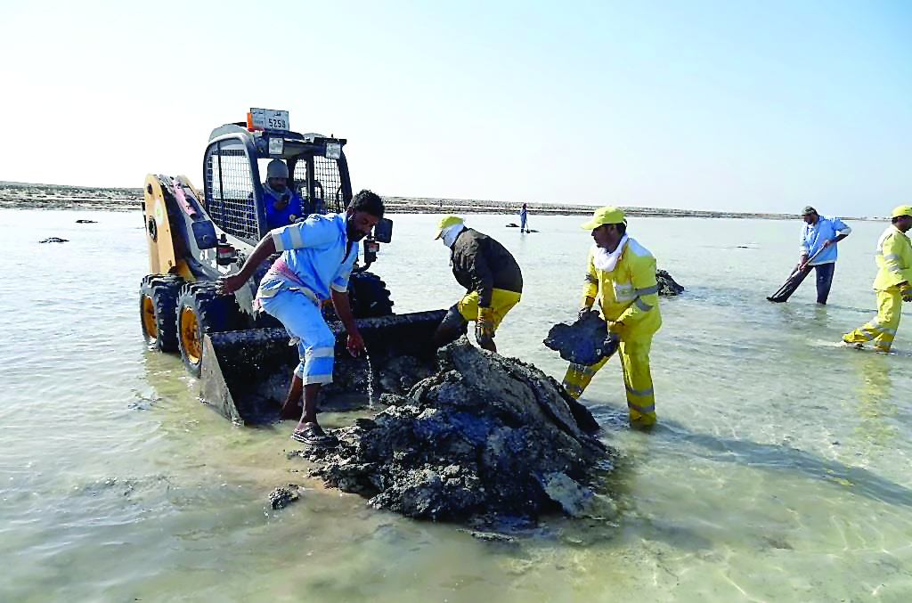 Waste being removed from a beach during the cleaning drive.