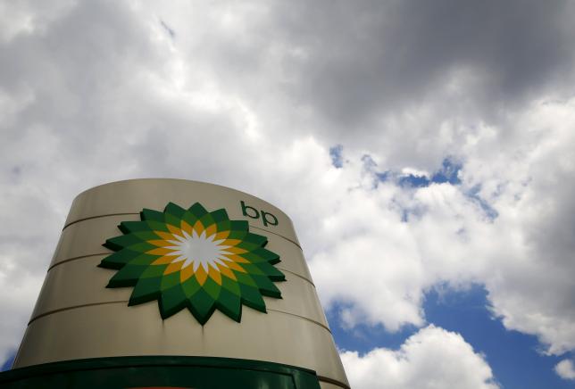Signage for a BP petrol station is pictured in London in this file picture taken  on July 29 2014 (Reuters / Luke MacGregor) 