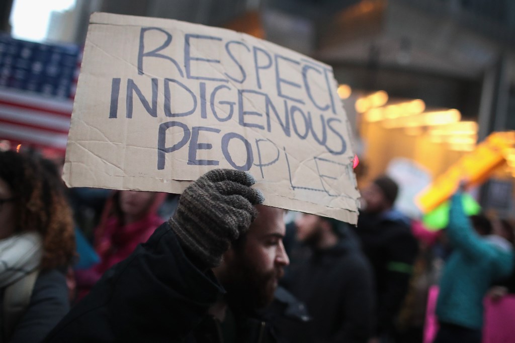 Protestors march through the Loop demonstrating against President Donald Trump on January 24, 2017 in Chicago, Illinois. Scott Olson/Getty Images/AFP