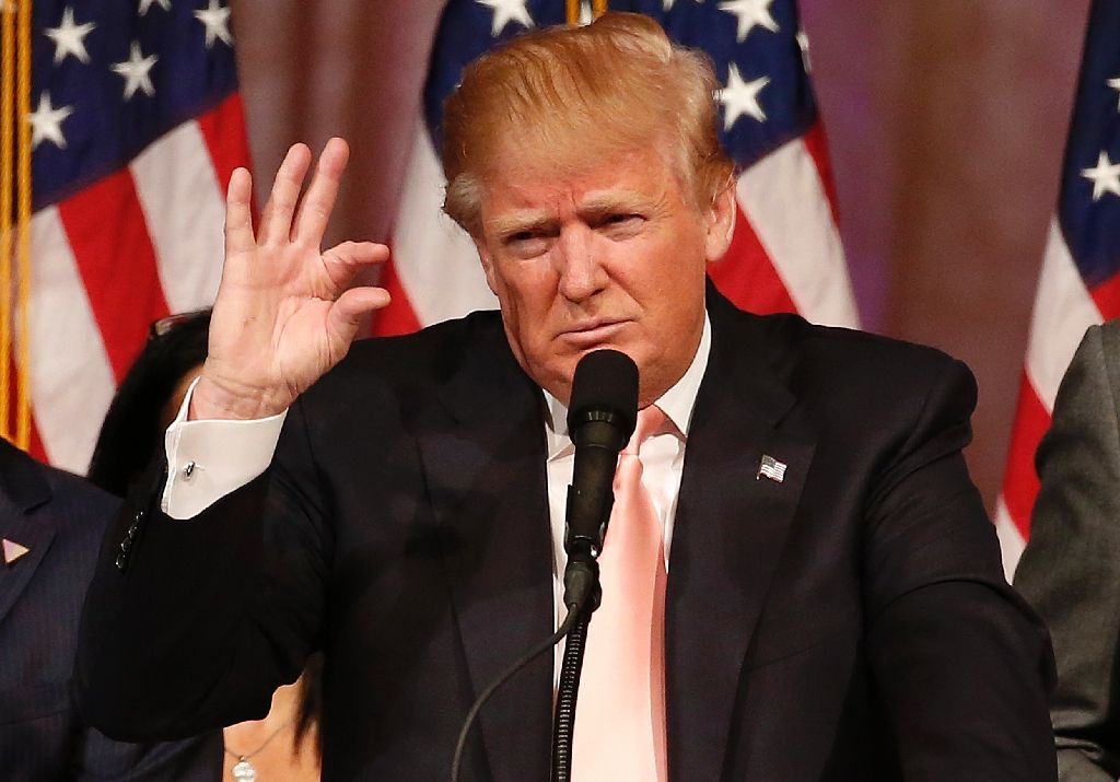 President-elect Donald Trump has threatened to tear up or renegotiate international free trade agreements in order to protect US jobs (AFP Photo/Rhona Wise ).