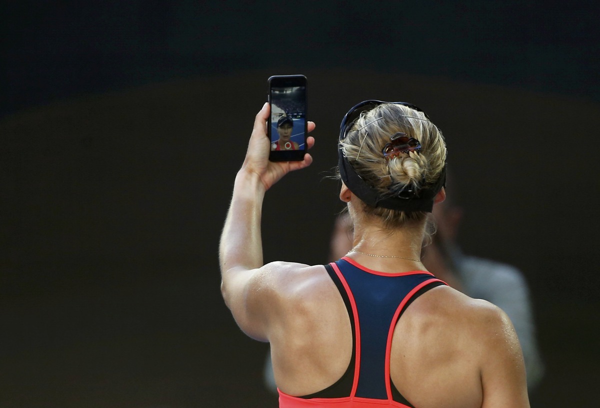 Croatia's Mirjana Lucic-Baroni takes a selfie photo after losing her Women's singles semi-final match against Serena Williams of the US. (REUTERS/Issei Kato)