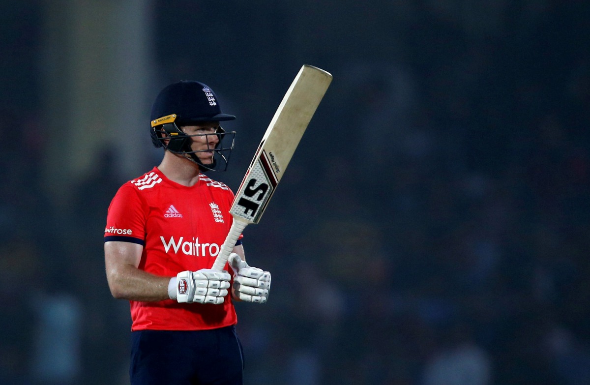 England's captain Eoin Morgan celebrates his half century. (REUTERS/Danish Siddiqui)