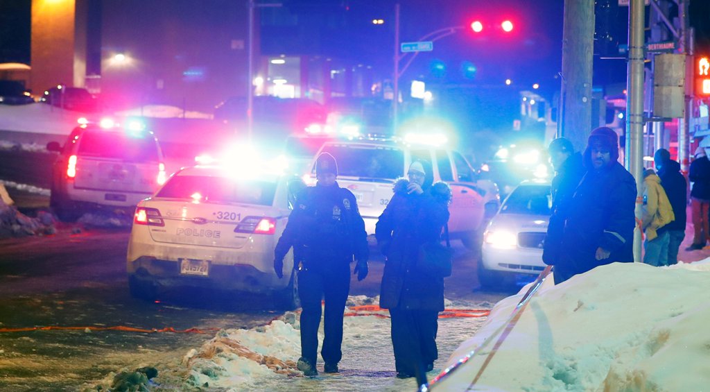 Police officers are seen near a mosque after a shooting in Quebec City, January 29, 2017. REUTERS/Mathieu Belanger TPX IMAGES OF THE DAY.