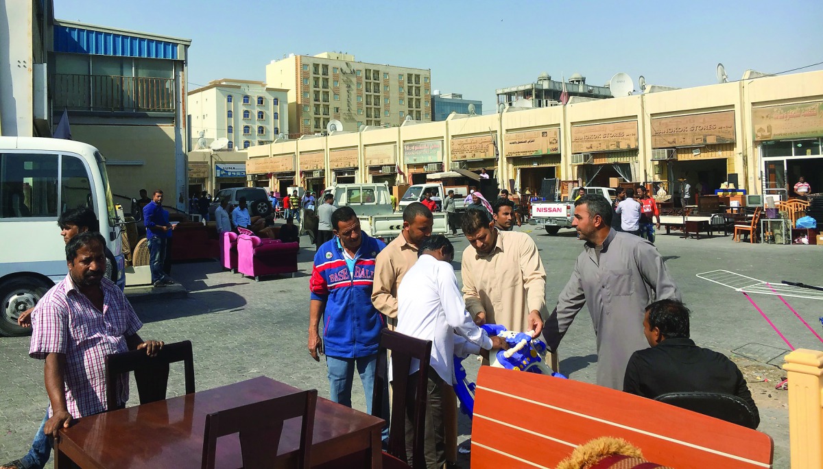 Customers at the Souq Al Haraj.