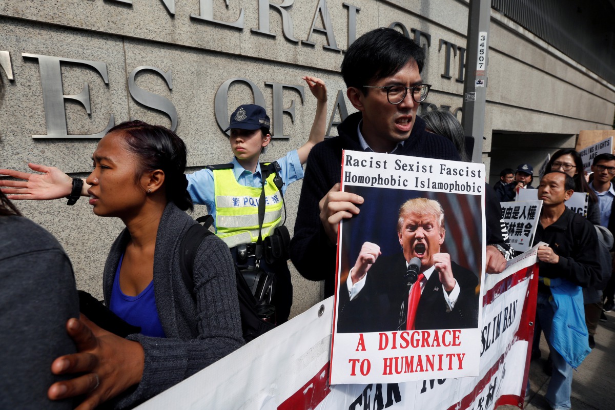 Protesters against the travel ban imposed by U.S. President Donald Trump's executive order march to the U.S. Consulate in Hong Kong, China February 1, 2017. REUTERS/Bobby Yip