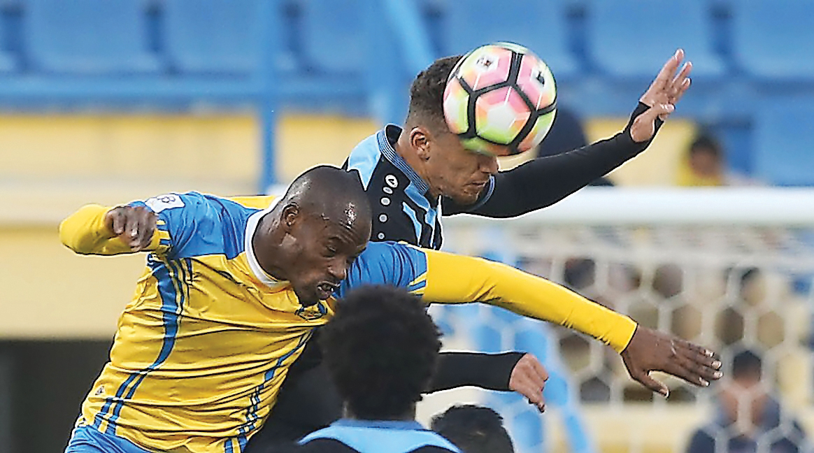 Action from the Qatar Stars League match between Al Gharafa and Al Wakrah at Al Gharafa Stadium yesterday.