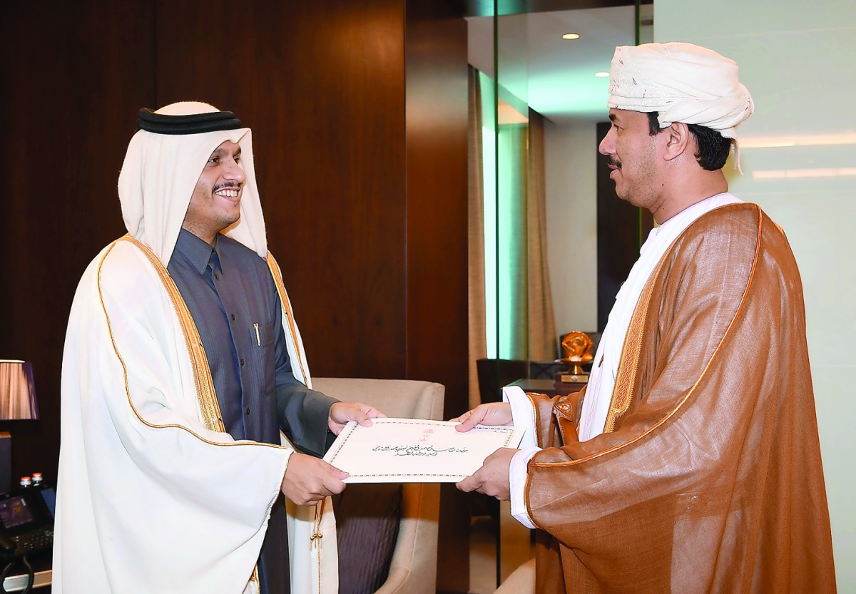Foreign Minister H E Sheikh Mohamed bin Abdulrahman Al Thani receiving a copy of the credentials of Oman's new Ambassador to Qatar, Najeeb bin Yahya Al Balushi. The Minister wished the Ambassador well on his new mission and further progress for bilateral 