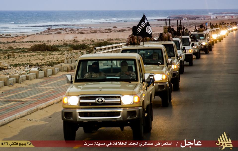 A video grab apparently showing members of the Islamic State  militant group parading in a street in Libya's coastal city of Sirte (AFP file photo)