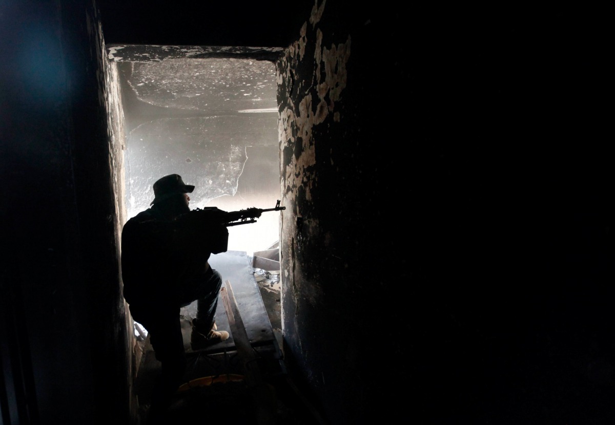 REPRESENTATIVE IMAGE: A fighter of Libyan forces allied with the UN backed government aims his weapon against Islamic State militants in Ghiza, Bahriya district in Sirte, Libya, Nov 9, 2016 (REUTERS) 