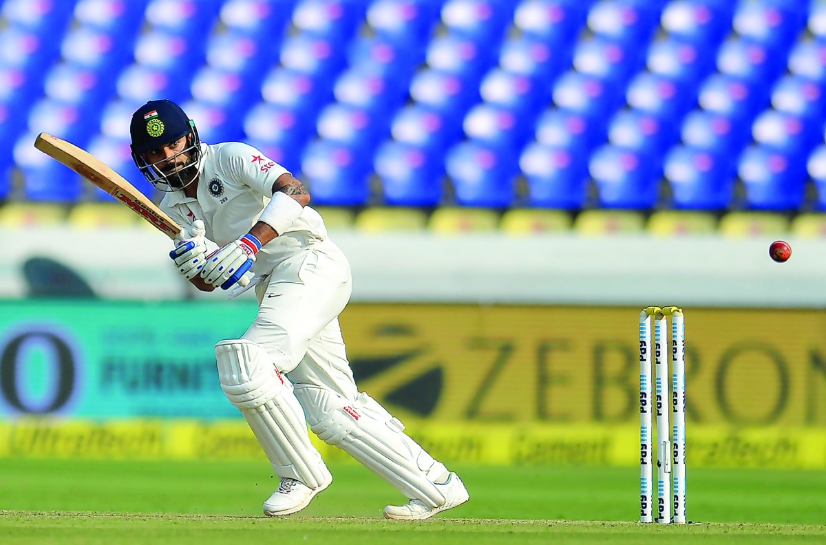 India's captain Virat Kohli plays a shot during the first day of the Test against Bangladesh at the Rajiv Gandhi International Cricket Stadium in Hyderabad on Thursday. 