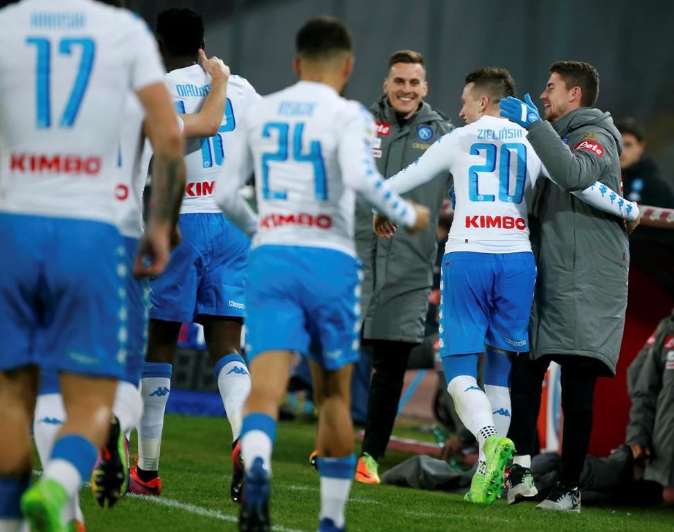 Napoli's Piotr Zielinski celebrates with teammates after scoring against Genoa. REUTERS/Ciro De Luca
