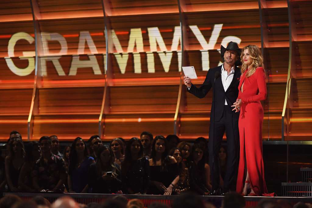 LOS ANGELES, CA - FEBRUARY 12: Recording artists Tim McGraw (L) and Faith Hill speak onstage during The 59th GRAMMY Awards at STAPLES Center on February 12, 2017 in Los Angeles, California. Kevork Djansezian/Getty Images/AFP.