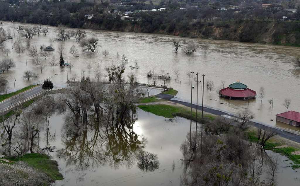 Riverbend Park is seen under flood water in Oroville, California on February 13, 2017. AFP / Josh Edelson
