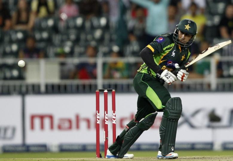 Pakistan's Nasir Jamshed plays South Africa's Lonwabo Tsotsobe's delivery during their first Twenty20 cricket match in Johannesburg November 20, 2013. (REUTERS/Siphiwe Sibeko)