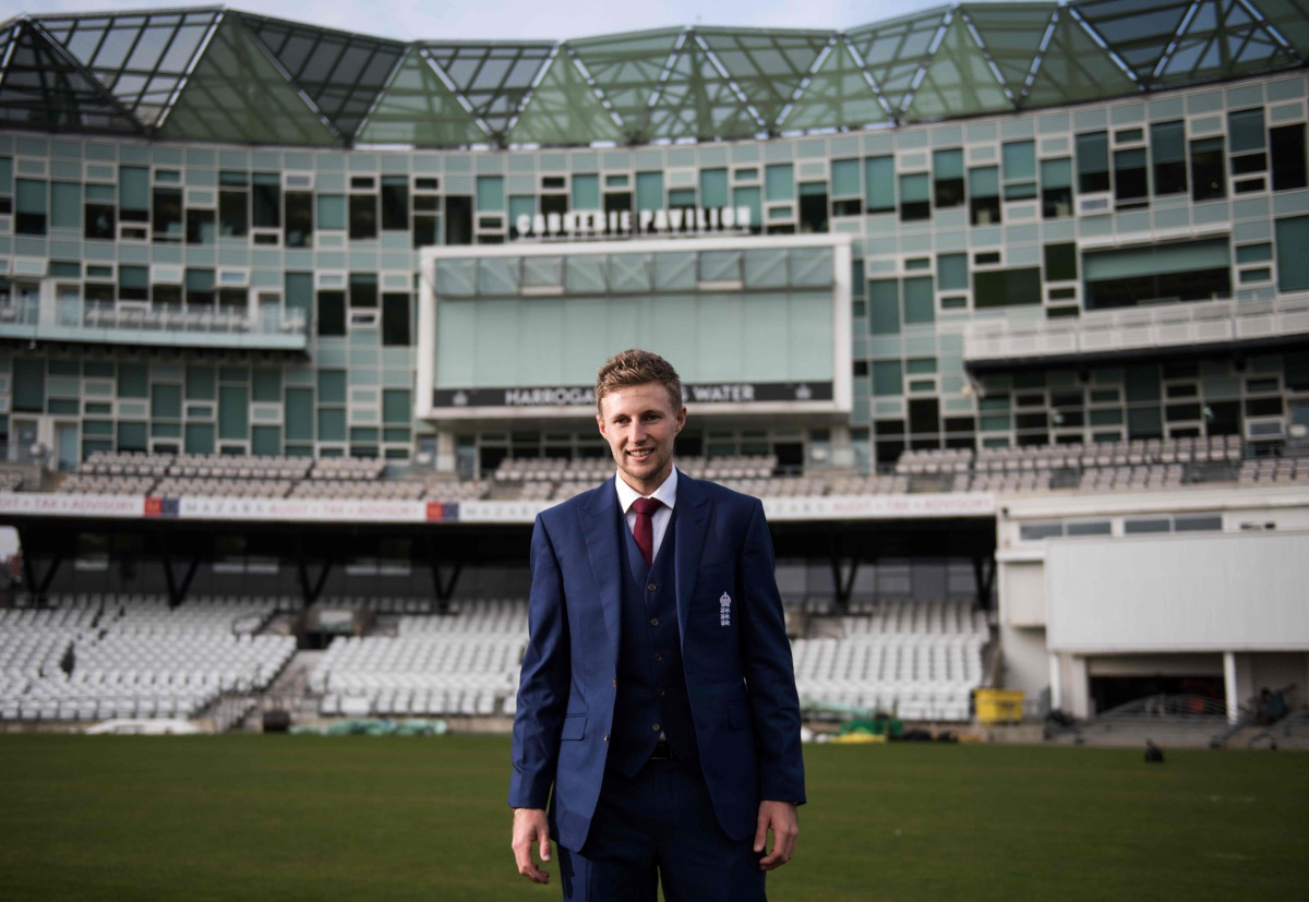 England's newly-announced cricket Test captain Joe Root poses for photographers ahead of a news conference at Headingly stadium in Leeds, north-east England, on February 15, 2017. Root said he felt 