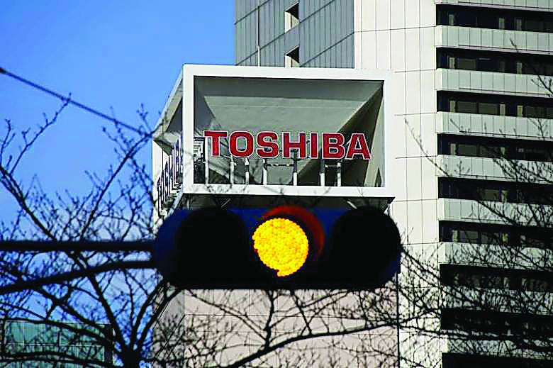 Toshiba shares fall 9% after S&P downgrade warning