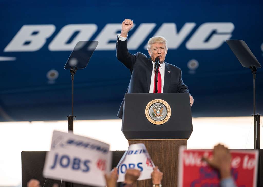 U.S. President Donald Trump addresses a crowd during the debut event for the Dreamliner 787-10 at Boeing's South Carolina facilities on February 17, 2017 in North Charleston, South Carolina.  Sean Rayford/AFP