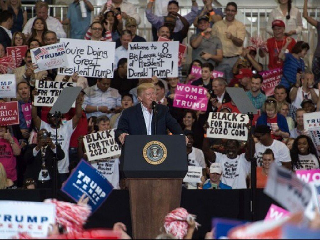 US President Donald Trump addresses a rally at the Orlando Melbourne International Airport on February 18, 2017 in Melbourne, Florida. PHOTO: AFP.