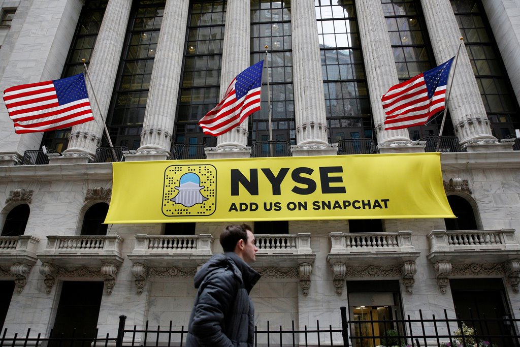FILE PHOTO: A Snapchat sign hangs on the facade of the New York Stock Exchange (NYSE) in New York City, U.S., January 23, 2017. REUTERS/Brendan McDermid/File Photo
