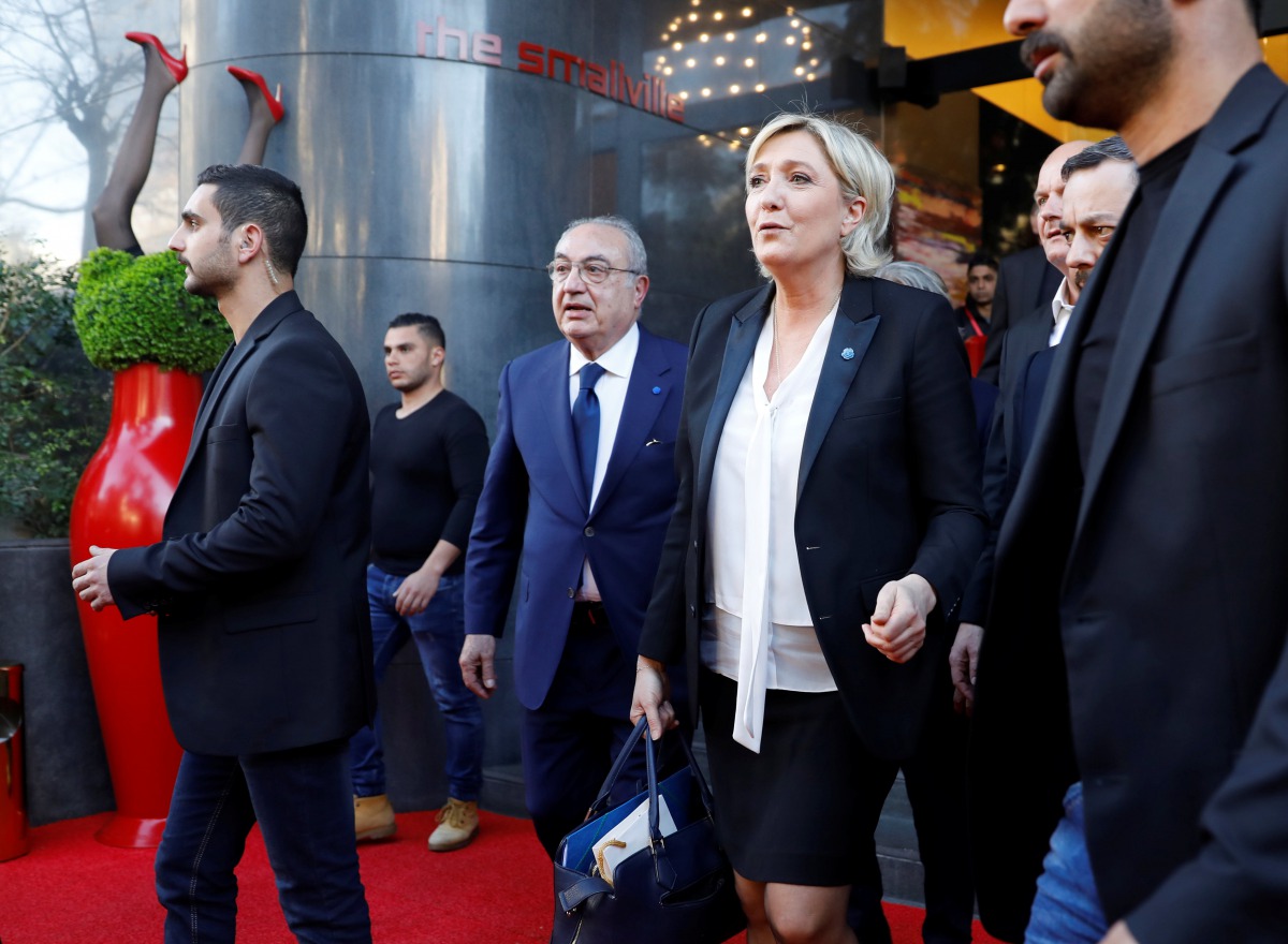 Marine Le Pen, French National Front (FN) political party leader and candidate for French 2017 presidential election, leaves a hotel after delivering a news conference in Beirut, Lebanon February 21, 2017. REUTERS/Jamal Saidi