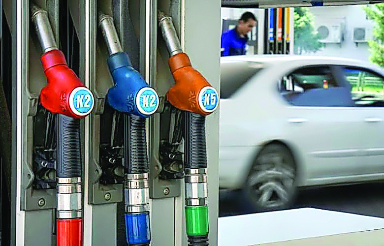 Fuel pump nozzles are pictured at a Helios petrol station in Almaty, Kazakhstan.
